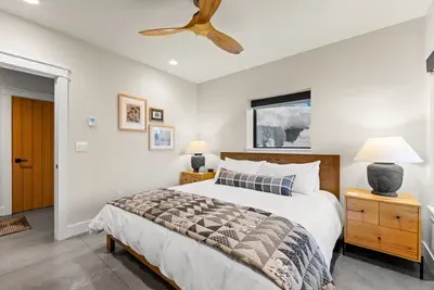 Every adult gets a real bed and a room that feels like a retreat