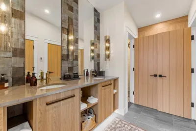 “Double bathroom” upstairs: two sinks, two toilets, two showers.