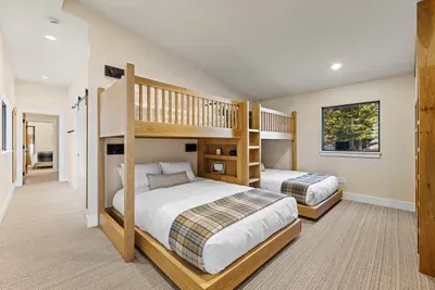 Bunk room heaven—kids and teens get their own camp‑style hangout.