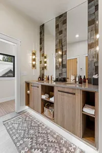 Arguably the most thoughtfully designed bathroom designed--double sinks, double toilets, and double showers on the top floor bath
