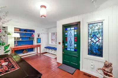 Step inside: original woodwork, vintage charm, and that “old family cabin” feeling
