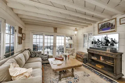 The living room is made for books, board games, and one more round of stories