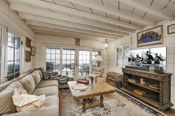 The living room is made for books, board games, and one more round of stories