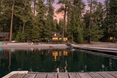 The cabin from the water: classic McCall lines, perched just above the shoreline