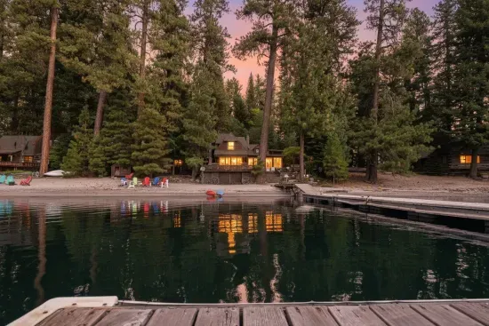 The cabin from the water: classic McCall lines, perched just above the shoreline