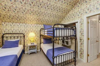 Two bunks, two twins, and endless whispered secrets after lights out