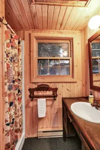 Full bath with a walk-in shower in The Wigwam, perfectly convenient