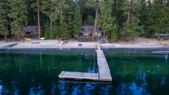 70 feet of private sandy beach—no crowds, no chaos, just your people and the lake
