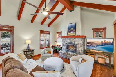 Board games at the table, a movie by the fireplace, and snacks coming from the kitchen—one simple, shared space for all your downtime