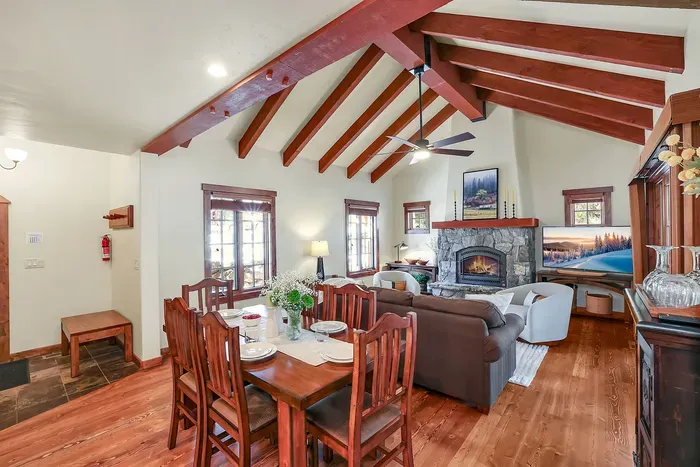 Sink into the sofa by the fire while someone stirs a pot on the stove—this is the heart of First Tracks + Fairways