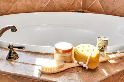 This isn’t just a bathroom; it’s your post‑adventure ritual spot: hang the towels, draw a bath, and let the steam do the rest