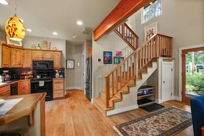 The Outpost has 2 bedrooms (both have king beds) + 2 bathrooms, one upstairs and one downstairs. We'll explore the main floor bedroom/bathroom first...