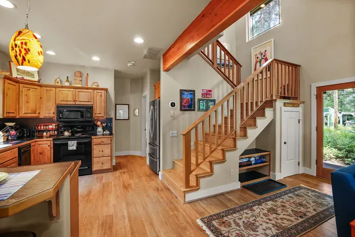 The Outpost has 2 bedrooms (both have king beds) + 2 bathrooms, one upstairs and one downstairs. We'll explore the main floor bedroom/bathroom first...