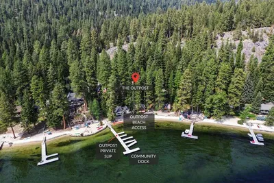 The ultimate outdoor playground on Payette Lake! Enjoy access to your own private slip on the community dock as well as 10' of sandy beach frontage. In the winter, you're just minutes from snowmobile trail access