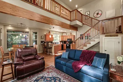 The home features an open concept main floor perfect for entertaining, as well as an upstairs loft for an additional space to relax and recharge