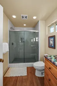 It also has a spacious walk-in tiled shower