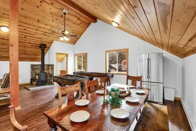 Feast and Chill: The bonus room features a dining table that seats 8, perfect for big meals or game nights. Plus, with the extra French door fridge nearby, you've got plenty of space to keep your snacks and drinks chilled
