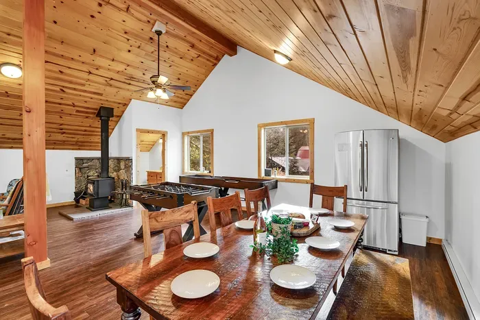 Feast and Chill: The bonus room features a dining table that seats 8, perfect for big meals or game nights. Plus, with the extra French door fridge nearby, you've got plenty of space to keep your snacks and drinks chilled