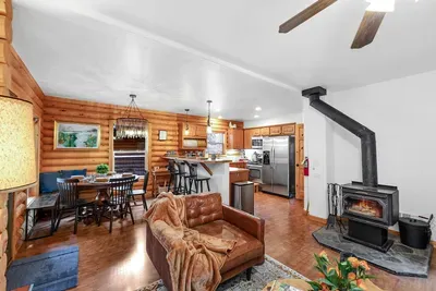 The open-concept main floor is all about good vibes, letting you skip from kitchen to couch with ease and enjoy every moment with your crew