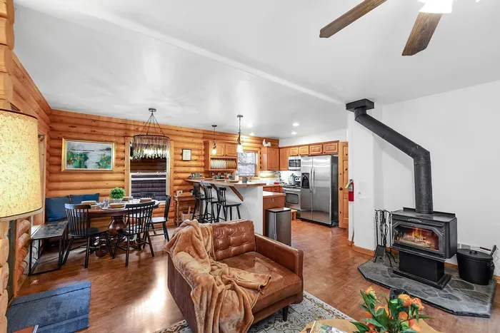 The open-concept main floor is all about good vibes, letting you skip from kitchen to couch with ease and enjoy every moment with your crew