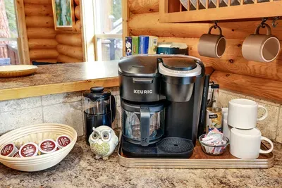 Coffee station with French press + Keurig Duo—fuel up before you hit the trails.