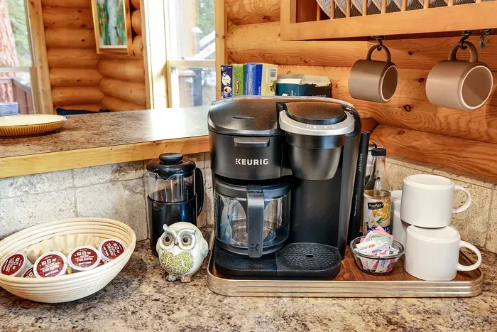 Coffee station with French press + Keurig Duo—fuel up before you hit the trails.