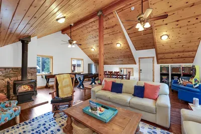 The bonus/game room above the garage is kid and teen heaven—let them take over this space while the adults relax in the main cabin