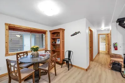 Unwind in the downstairs family room, a perfect space for kicking back with a good book or catching up on your favorite shows