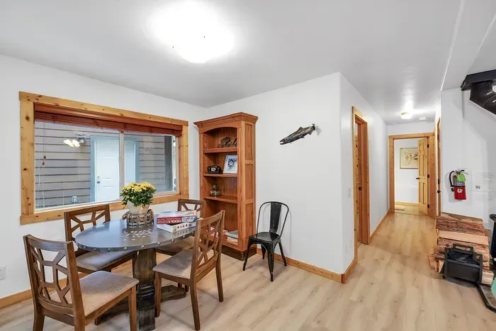 Unwind in the downstairs family room, a perfect space for kicking back with a good book or catching up on your favorite shows
