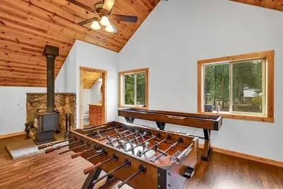 Challenge your friends to a foosball or shuffleboard match in Otter's Den's lively bonus room