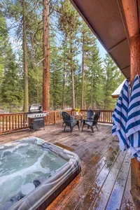 Whether you’re sipping your morning coffee or diving into a good book, the wraparound deck is your go-to spot for soaking up the peaceful vibes and forest views