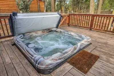 Kick back in the hot tub on the deck. It's the perfect spot to unwind and count the stars after a day of exploring