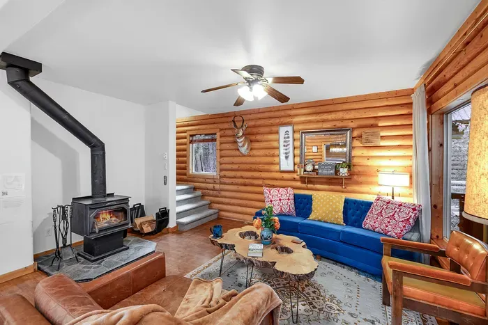 Gather around the wood stove on the main floor for laughs, games, and maybe a tall tale or two about your day's adventures