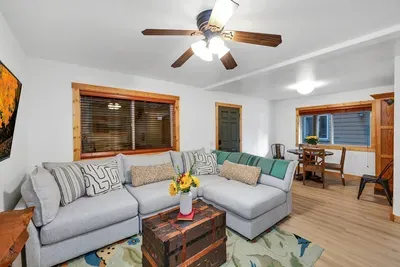 Whether you're watching TV or just lounging around, the downstairs family room provides a comfy and inviting escape for everyone to enjoy. The backyard is accessible from the family room