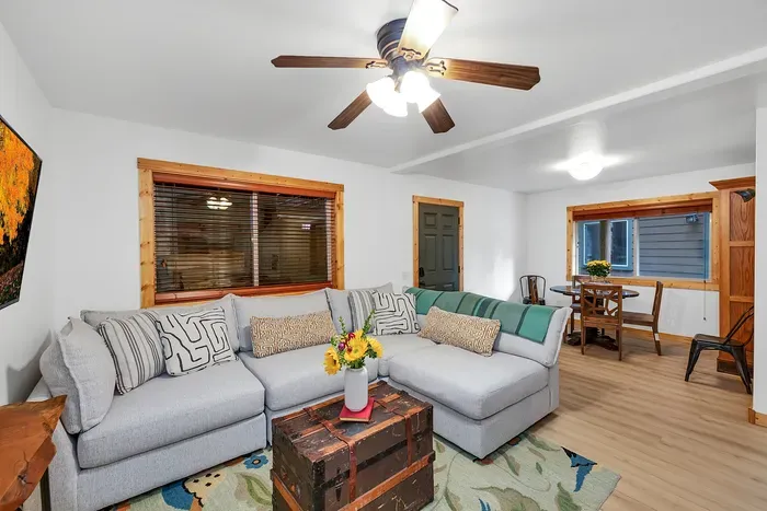 Whether you're watching TV or just lounging around, the downstairs family room provides a comfy and inviting escape for everyone to enjoy. The backyard is accessible from the family room