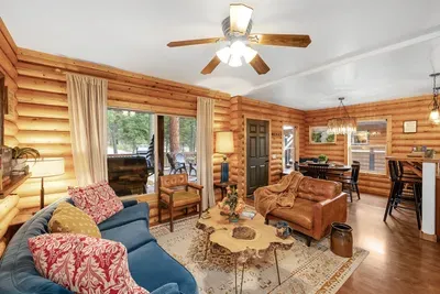 The main floor's open concept is all about keeping things warm and welcoming. With the kitchen, dining, and living areas all flowing together, it's the perfect spot for hanging out and making memories with your crew