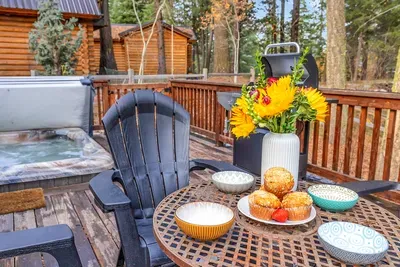 With ample seating on the wraparound deck, it's the ideal spot for morning coffee, afternoon reading, or simply soaking up the woods