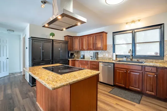 5-burner stove top, range, drip and keurig coffee maker, blender and other cooking supplies.