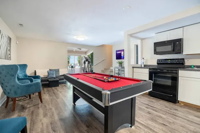 Pool table, smart TV and full second kitchen on the lower level.