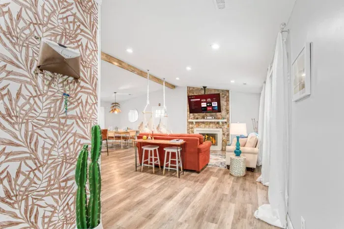 Touches of carefully curated unique style throughout the newly renovated and modern home, ensuring an unforgettable experience. Equipped with a cozy fireplace and a smart TV, perfect for relaxation.