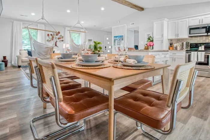 Elegant dining table, chairs and tableware set that accommodates seating for up to 6 people.