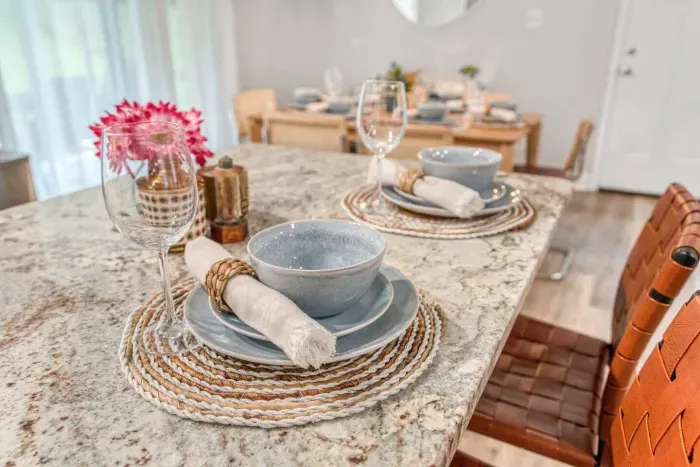 Additional seating for 2 people can be accommodated at the kitchen island.