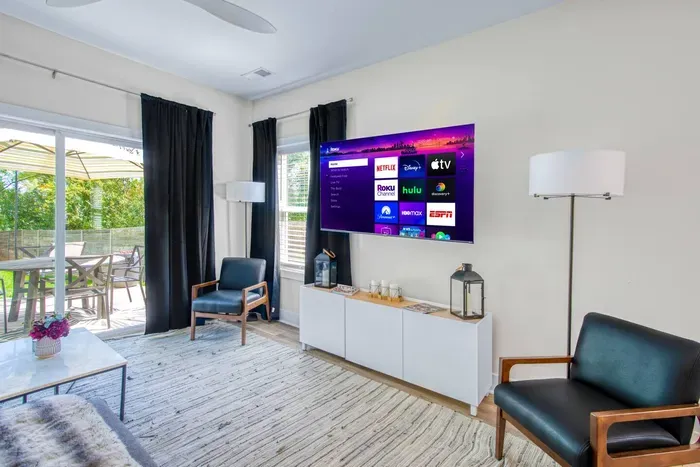 The perfect spot to unwind, entertain, and enjoy in this spacious living area filled with natural light