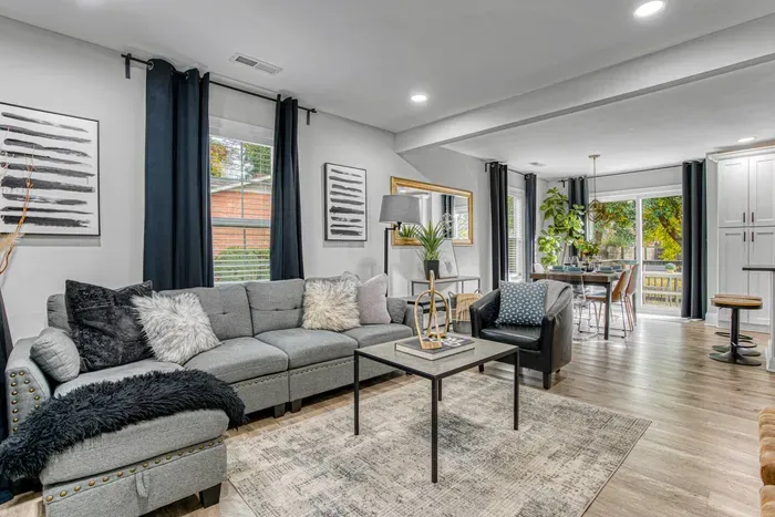Keep the conversation flowing in the newly renovated and modern open concept living area.