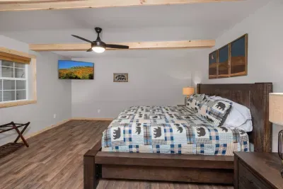 Unwind in the ultra-comfy master king bedroom, complete with a 50" Roku TV for your favorite late-night shows. ️