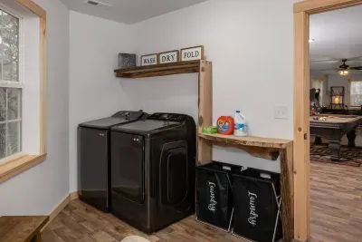 Enjoy the convenience of a dedicated laundry room with full-size washer and dryer—perfect for extended stays or post-adventure cleanups. ✨