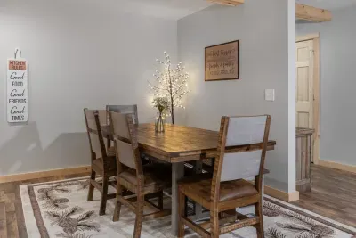 Dine in mountain elegance with this high quality Pueblo Grey wood table set from IFD, featuring seating for 6 with 4 chairs and a comfy bench.