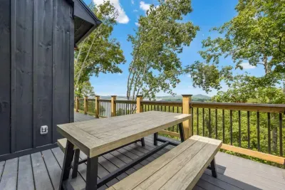 Unplug, unwind, and take it all in!  A private outdoor dining space with sweeping views—your front-row seat to nature.