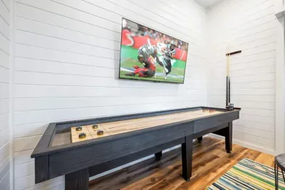 Our 9 ft premium shuffleboard table is built for smooth play and endless fun—one of the most-loved features in the home.