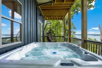 Hot tub + lake views = perfection.  Your favorite way to relax is waiting.